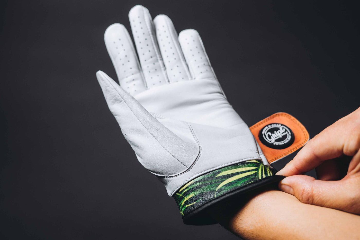 The Palm Leaves Golf Glove was designed with tour grade materials and boldly unique design. Made with AAA Cabretta Leather. 